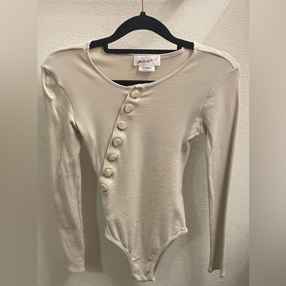 The Line by K Evelyn Asymmetrical Buttoned Long Sleeve Bodysuit - Picture 5 of 7